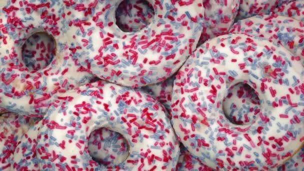 Donuts With Icing And Sprinkles — Stock Video