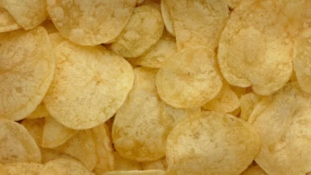 Golden Potato Chips Rotating — Stock Video