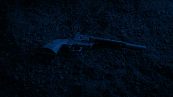 Six Shooter Gun Ground Night — стоковое видео