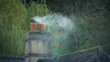 Chimney Smokes In Rural Area