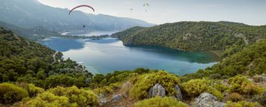 Tandem paragliding in Oludeniz, Turkey clipart
