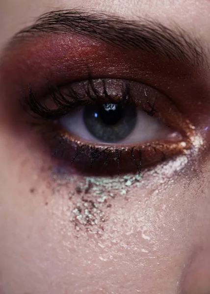 Natural make-up eyes close-up with the band.