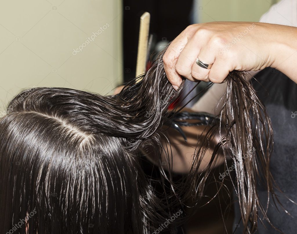 Brushing the wet hair — Stock Photo © photosampler 127955600
