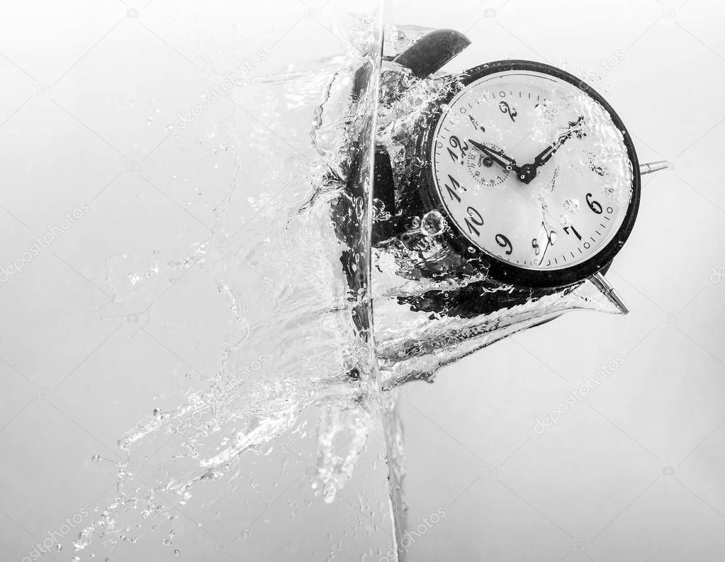 Drowning clock in the water