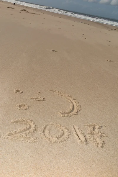 Digits 2017 on the sand seashore - concept of new year — Stock Photo, Image