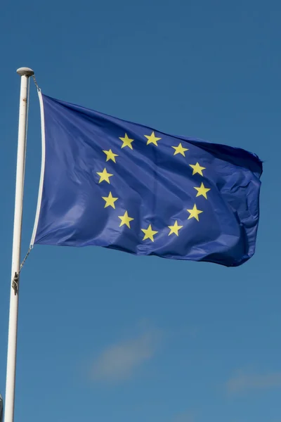 European Union Flag, a Blue sky background. — Stock Photo, Image