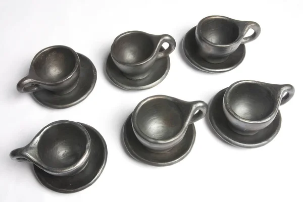 Té en el servicio de té negro. Set de té consta de seis elegantes tazas . — Foto de Stock