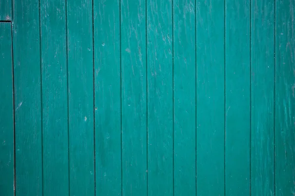 Bottom of vertical planks in bright green wood — Stock Photo, Image
