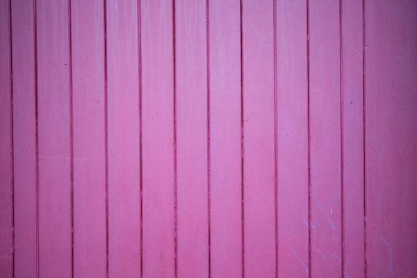 Fondo de tablones verticales en madera rosa brillante o púrpura —  Fotos de Stock