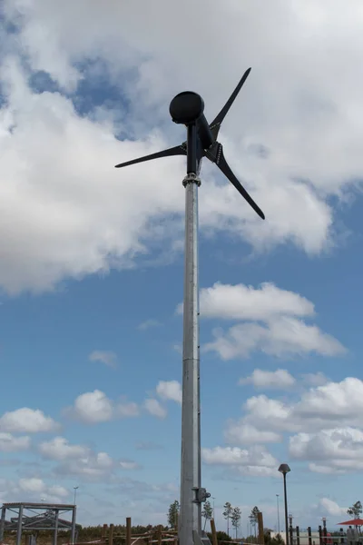 Personal wind turbine in a garden — Stock Photo, Image