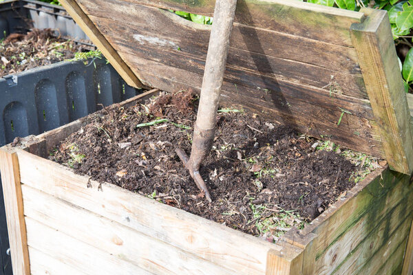 Family compost to recycle kitchen waste and garden