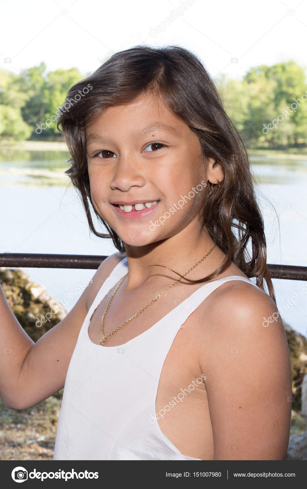 Beautiful Girl Smiling Child With Wavy Hair Stock Photo