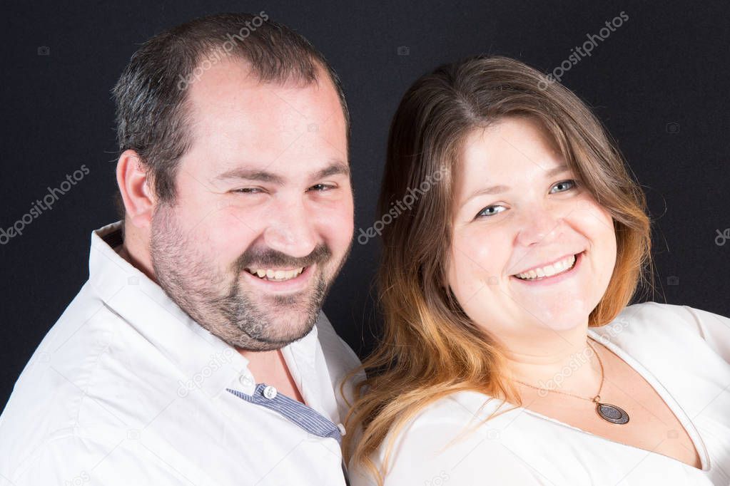 smiling thirty-year-old couple