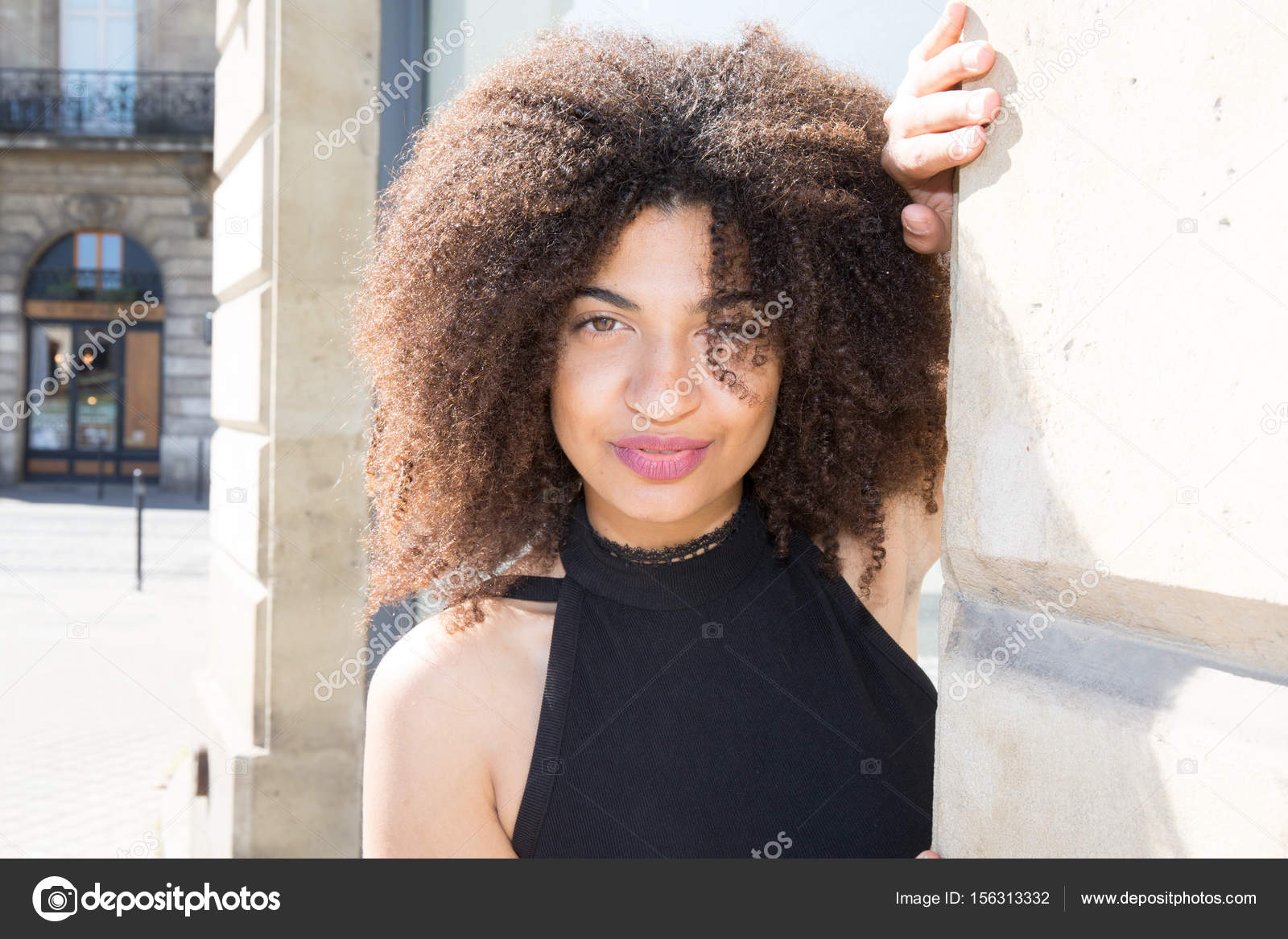 Pretty Mixed Black Girl With Curly Hairs Outdoor Stock Photo