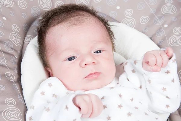 Lying newborn baby open eyes — Stock Photo, Image