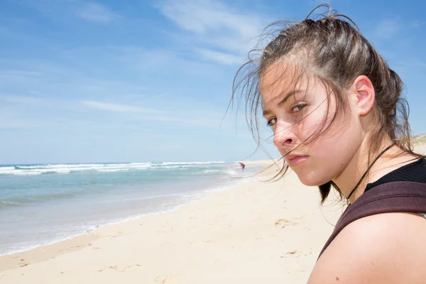 sadness girl on sand sea beach in summer time