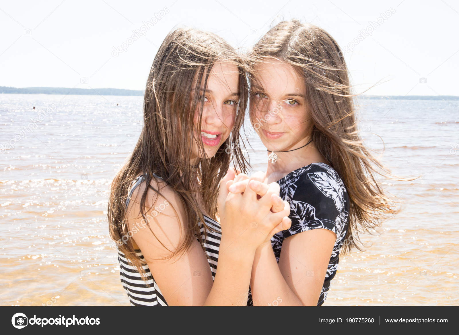 Beautiful Two Twins Sisters Together Fun Close Beauty Portrait Beach Stock  Photo by ©OceanProd 190775268