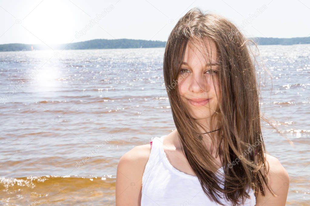 young slim beautiful woman on sunset beach summer vacation positive mood romantic girl