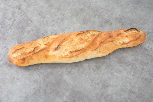 Ein Einziges Französisches Baguette Grauen Hintergrund — Stockfoto