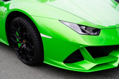 Bordeaux, Aquitaine / France - 11 18 2019: Lamborghini Huracan evo car Performante front wheel on green supercar