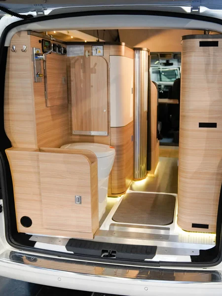 Modern camper inside van back interior bed