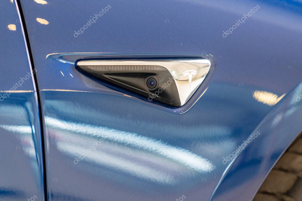 Bordeaux , Aquitaine / France - 11 25 2019 : tesla car side rear view camera close up for parking assistance