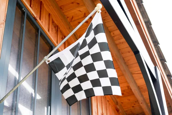 checkered Waving Flag on garage wall Motor Race