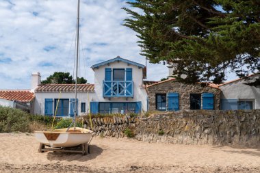house on the beach on the island of Noirmoutier vendee in France clipart