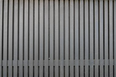 Gri ahşap duvarlı çiftlik evi tarzı arka plan Yatay çekim dikey gri tahta