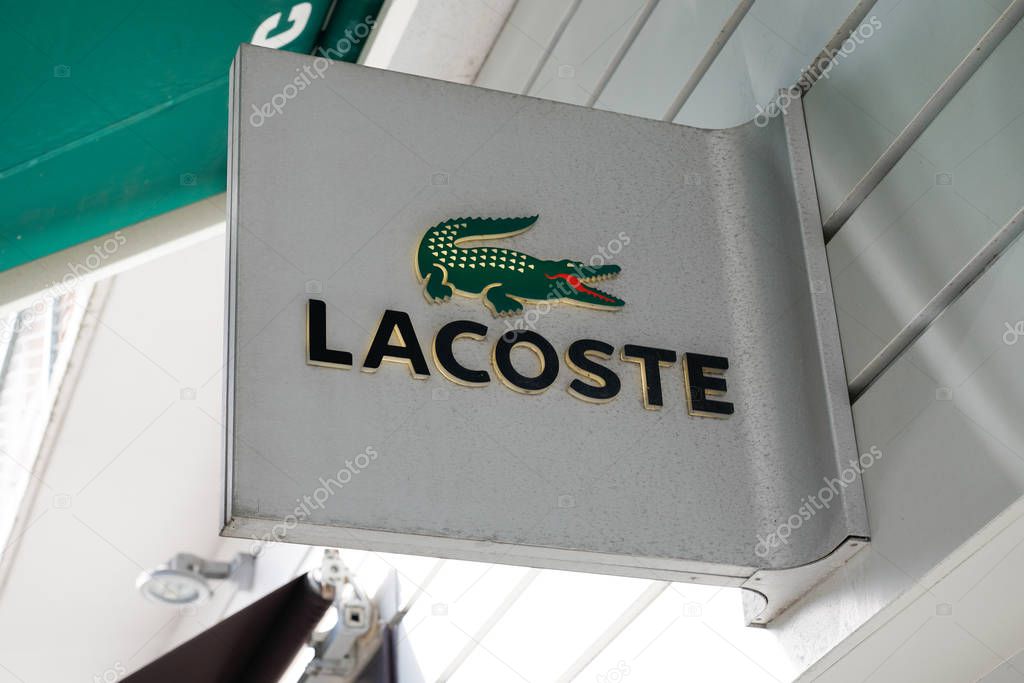 Bordeaux , Aquitaine / France - 02 15 2020 : lacoste logo crocodile sign store famous french chain of luxury polo sport clothes