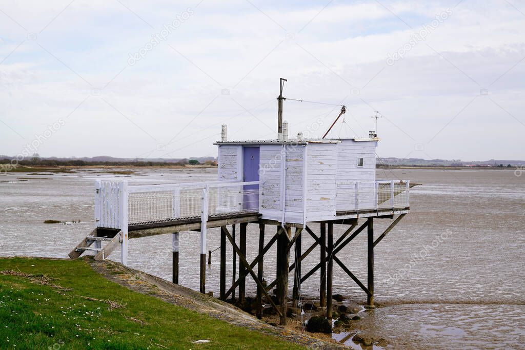 white wooden fishing huts with net in Talmont sur Gironde france