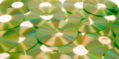 Gökkuşağı sarı cd koleksiyonu arkaplan görünümlü duvar kağıdı üzerindeki dvd bulanıklığı