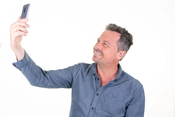 Portrait Side Profile Cheerful Man Taking Selfie White Background — Stock Photo, Image