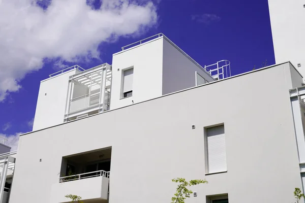 Modern white Luxury Apartment Building and blue sky