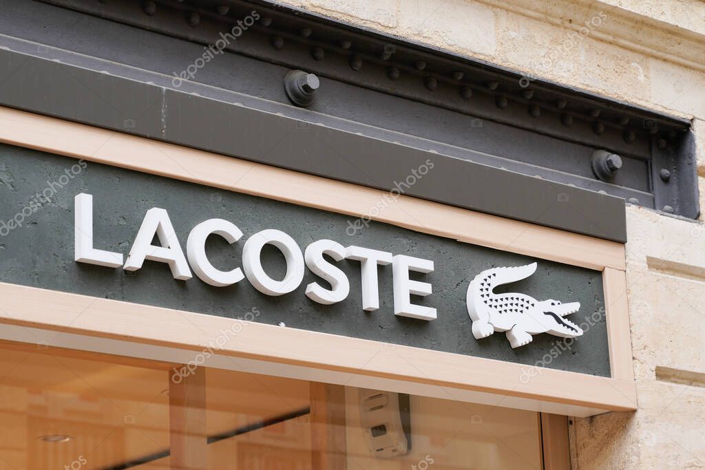 Bordeaux , Aquitaine / France - 05 05 2020 : Lacoste crocodile logo shop brand and sign on wall store