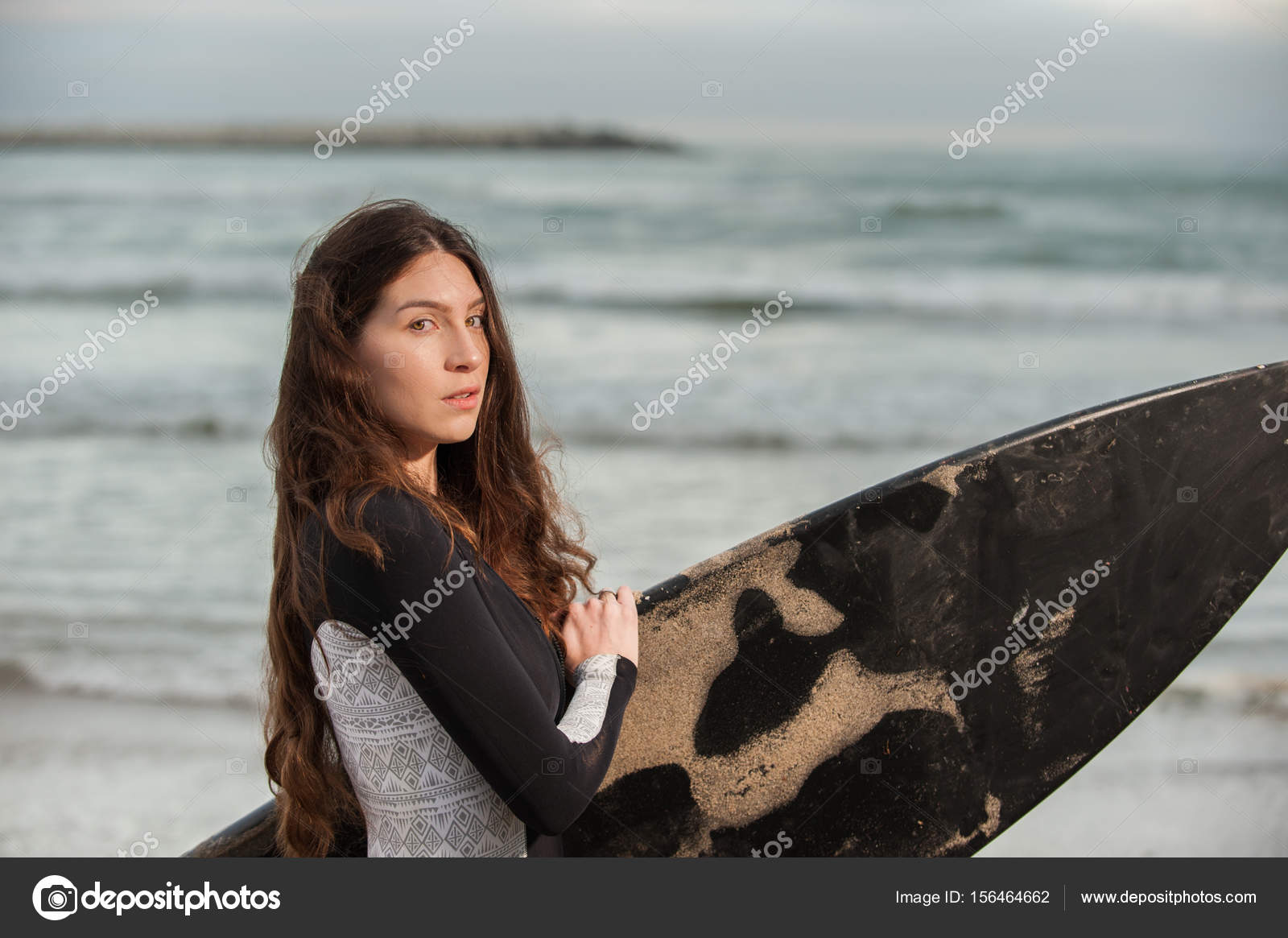 Busty surfer girl