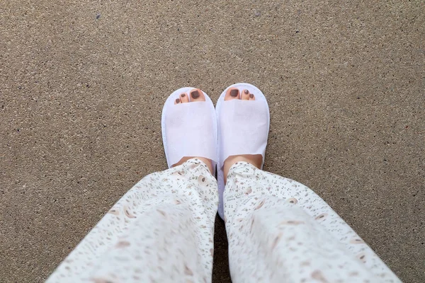Selfie Feet Wearing White Slippers Indoor On The Ground
