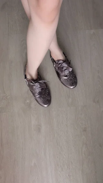 Feet Selfie in Brown Sneakers Standing on a Wooden Floor Background — Stock Photo, Image