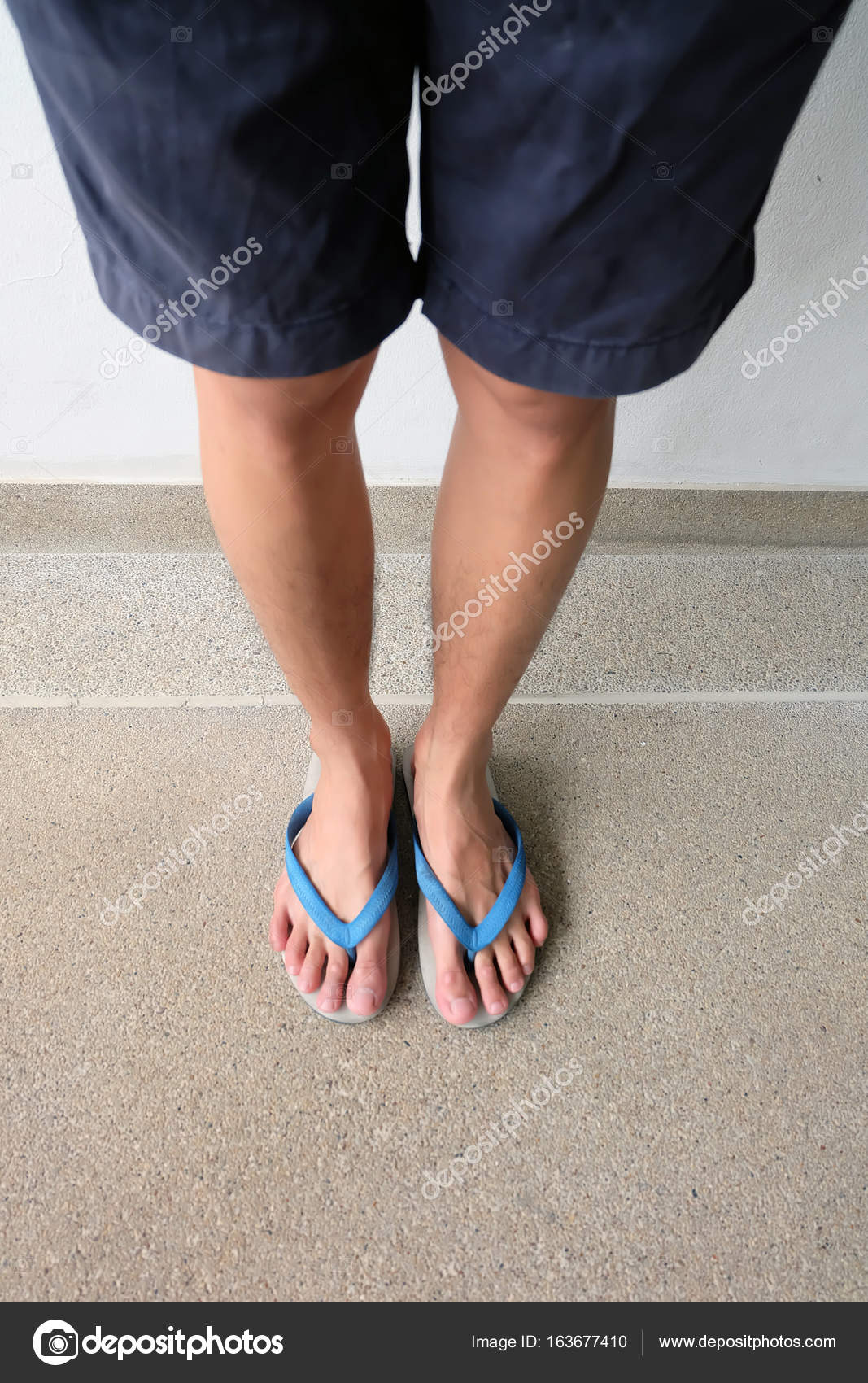 male feet in flip flops