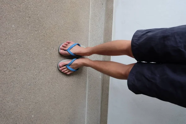 Male Feet Selfie Wearing Sandals Standing on Concrete Floor