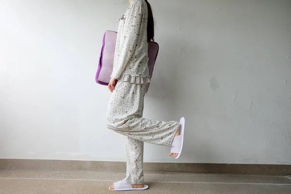 Girl Standing in Pajamas and White Slippers on The Floor Background — Stock Photo, Image