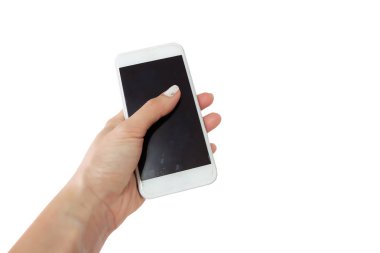 Kadın el telefon ile siyah perde beyaz arka plan üzerinde tutarak yukarı kapatın