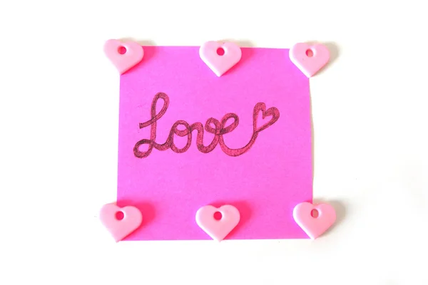 Rózsaszínű Papír Stick Megjegyzés Love Szöveg Írott Egy Fehér Háttér — Stock Fotó