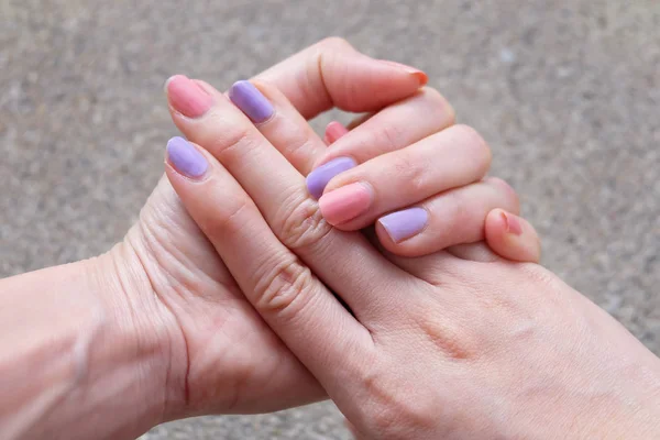 Nail Polish Manicure Beautiful Woman Hands Pink Violet Pastel Background — Stock Photo, Image