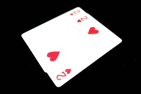 Δύο Από Μπαστούνια Παίζει Κάρτα Παίζοντας Χαρτιά Απομονωμένες Μαύρο Φόντο — Φωτογραφία Αρχείου