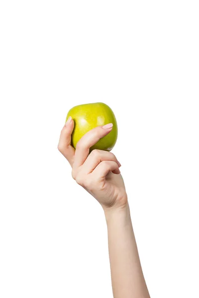 Mão de mulher com maçã verde isolada no fundo branco — Fotografia de Stock