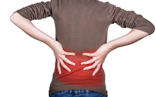 Little girl with back pain holding the hand isolated on white background. — Stock Photo, Image