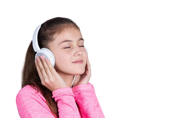 Mała dziewczynka korzystających muzyki w słuchawkach — Zdjęcie stockowe