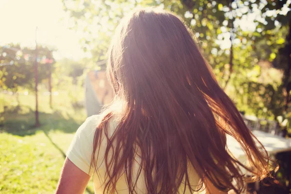 Little girl enjoying sunshine light