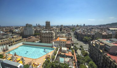 Barcelona Pool overlooking city clipart